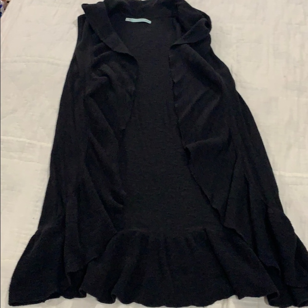 Sleeveless black sweater vest